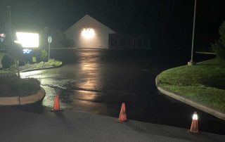 residential driveway sealcoated at night